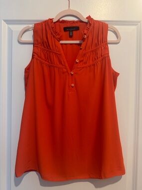 White House Black Market Orang top hardly worn